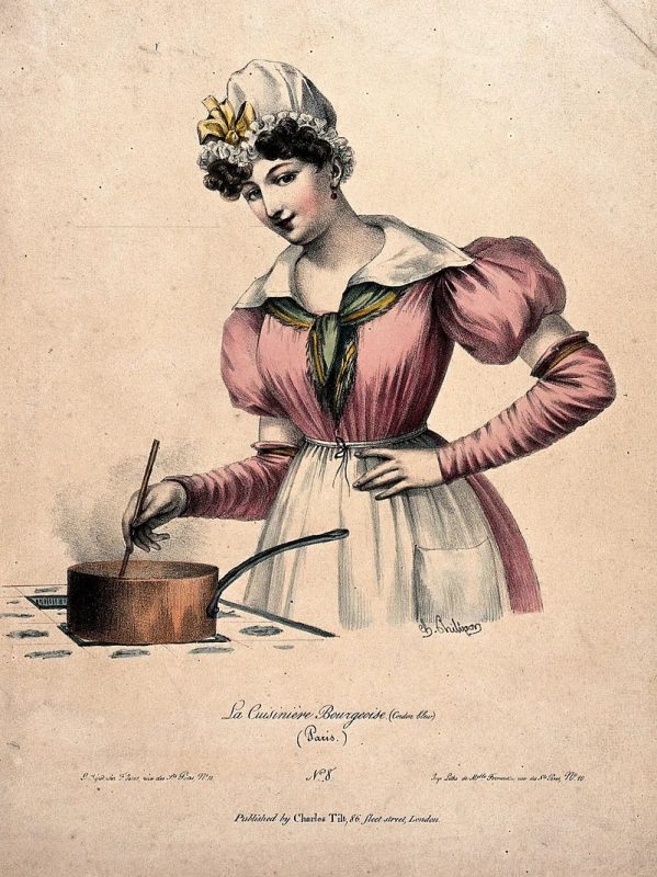 A woman mixing a medicinal herb in a pot.