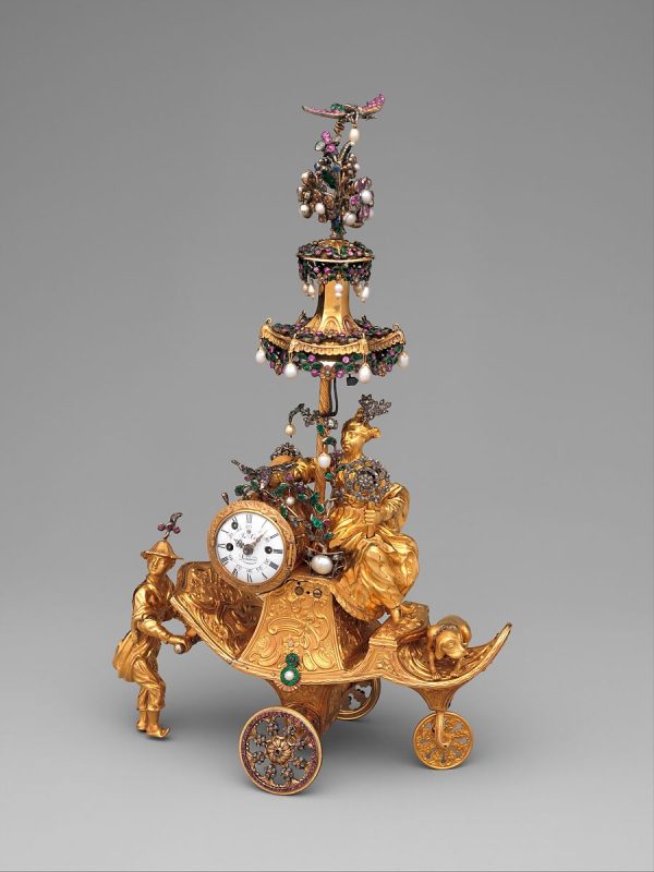 A picture of a lavish gold, pearl, and silver automaton.