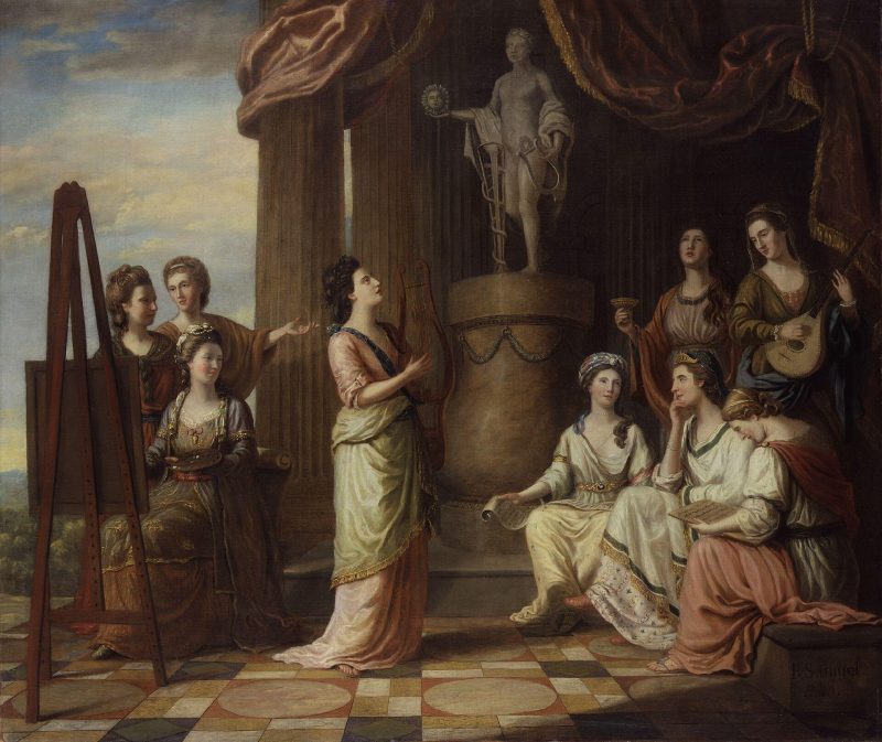 A gathering of a number of women beside a naked statue.