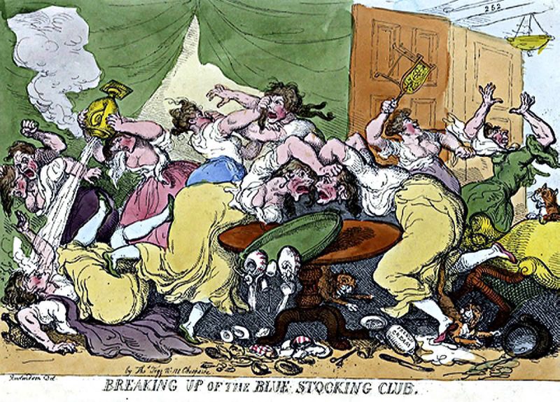 A riot of men and women inside a room.