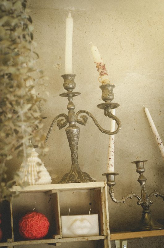 Candles attached to their stand.